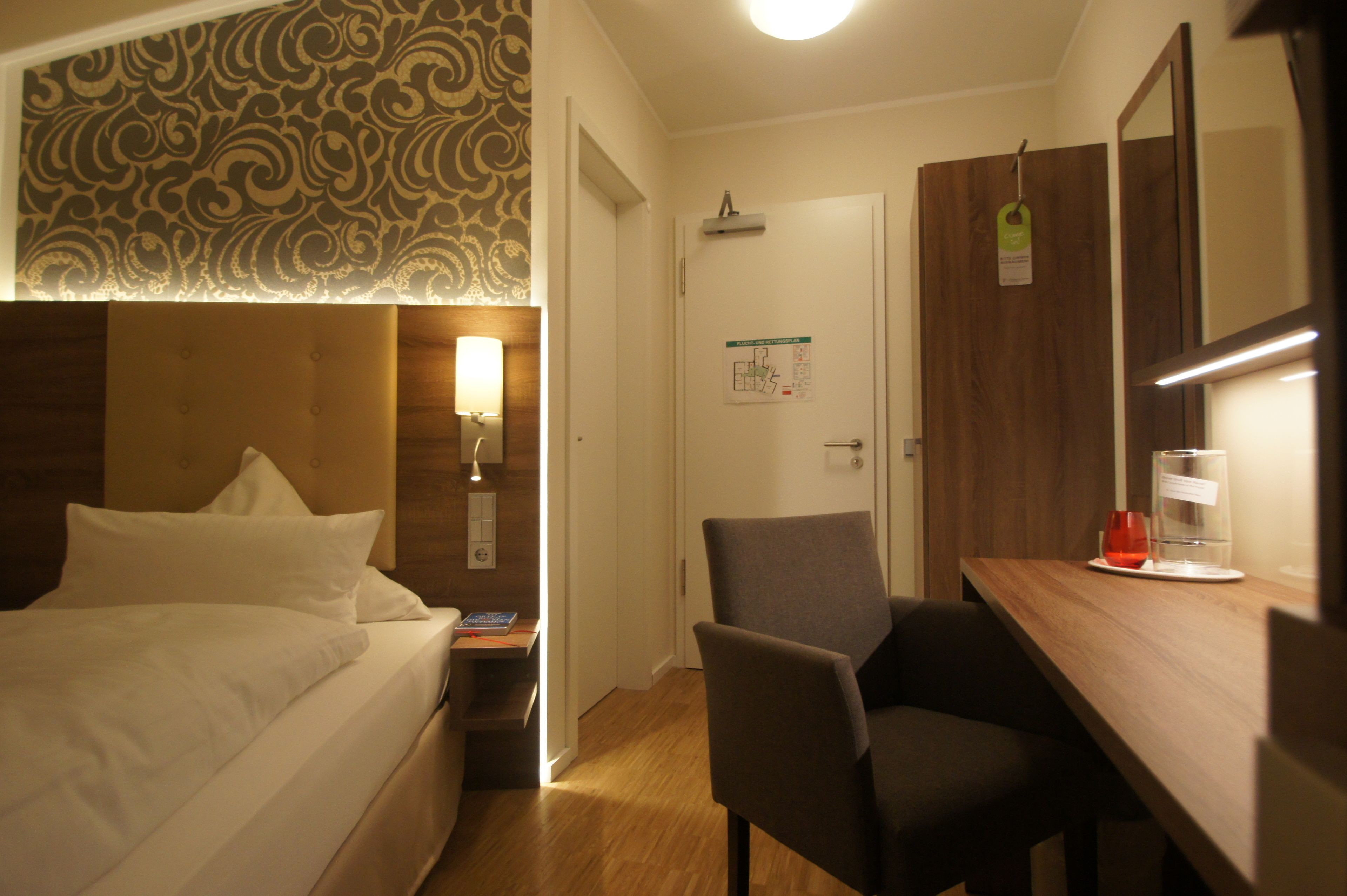 comfort single room | premium bedding, individually decorated, desk, blackout curtains