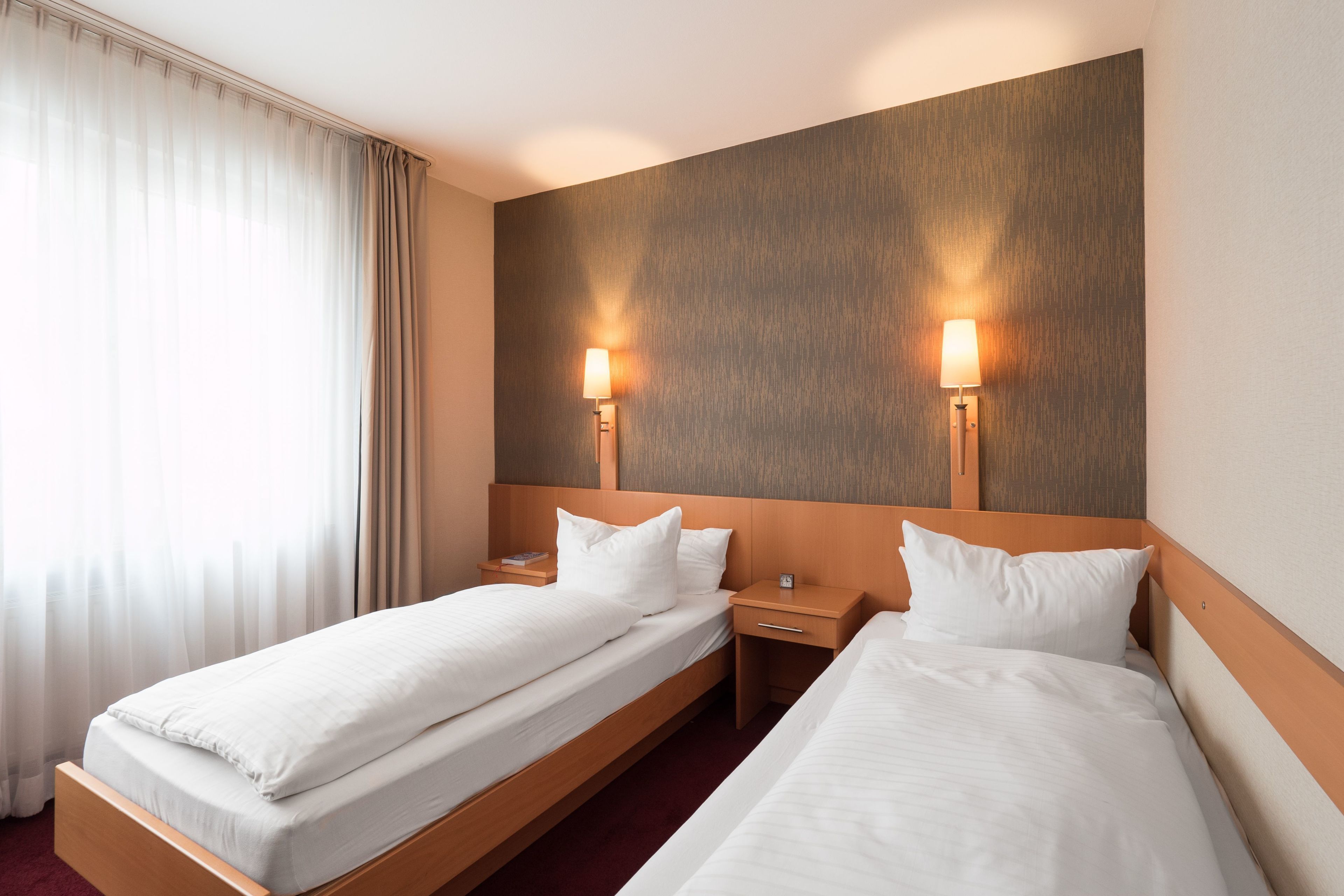 standard double room | premium bedding, individually decorated, desk, blackout curtains