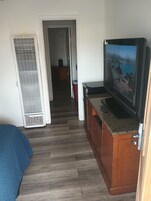 Basic Apartment, 2 Double Beds, Kitchenette | Living area | TV