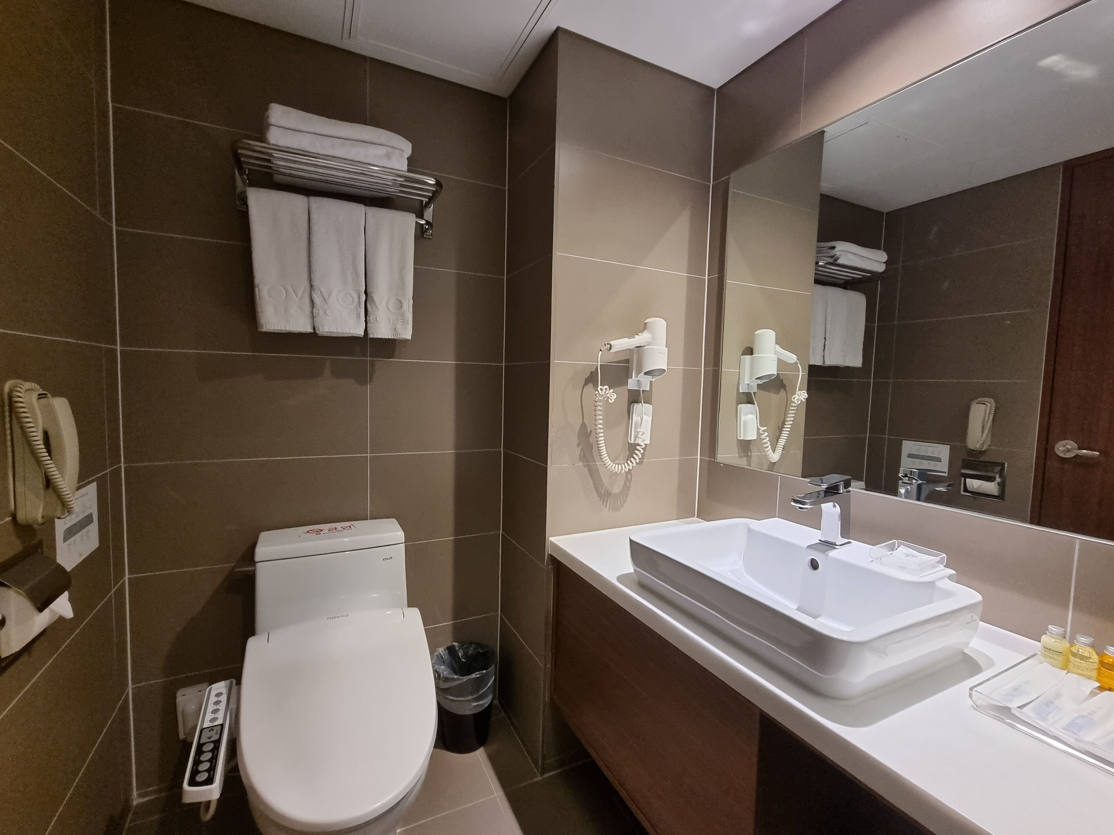 free toiletries, hair dryer, slippers, bidet