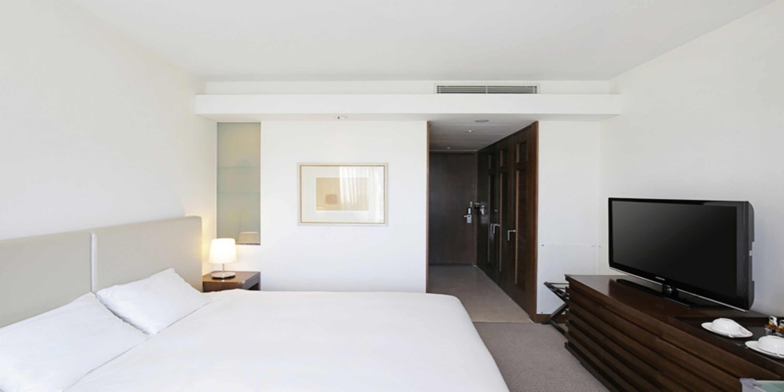 Habitación individual estándar | Edredón y artículos del minibar gratis 