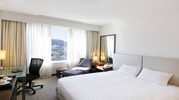 Standard Single Room | Down comforters, free minibar, in-room safe, individually decorated