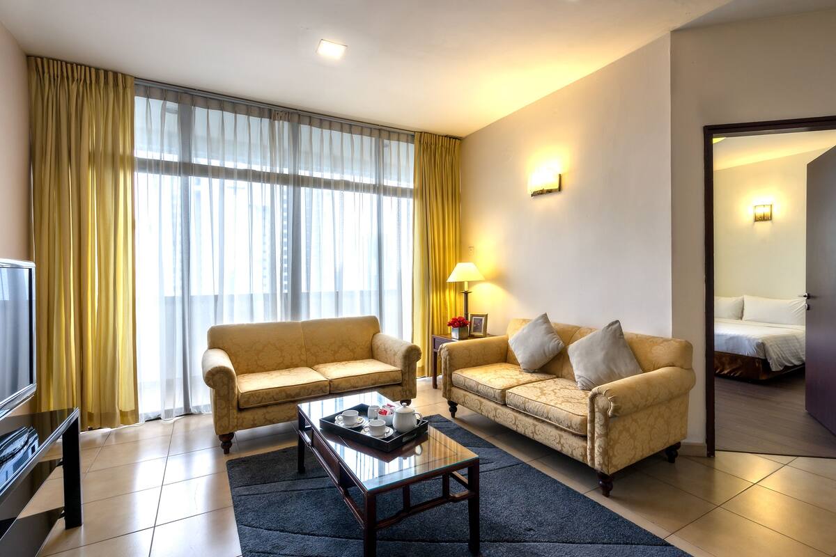 Three-Bedroom Family Room | Living area | 42-inch LED TV with cable channels, TV, DVD player