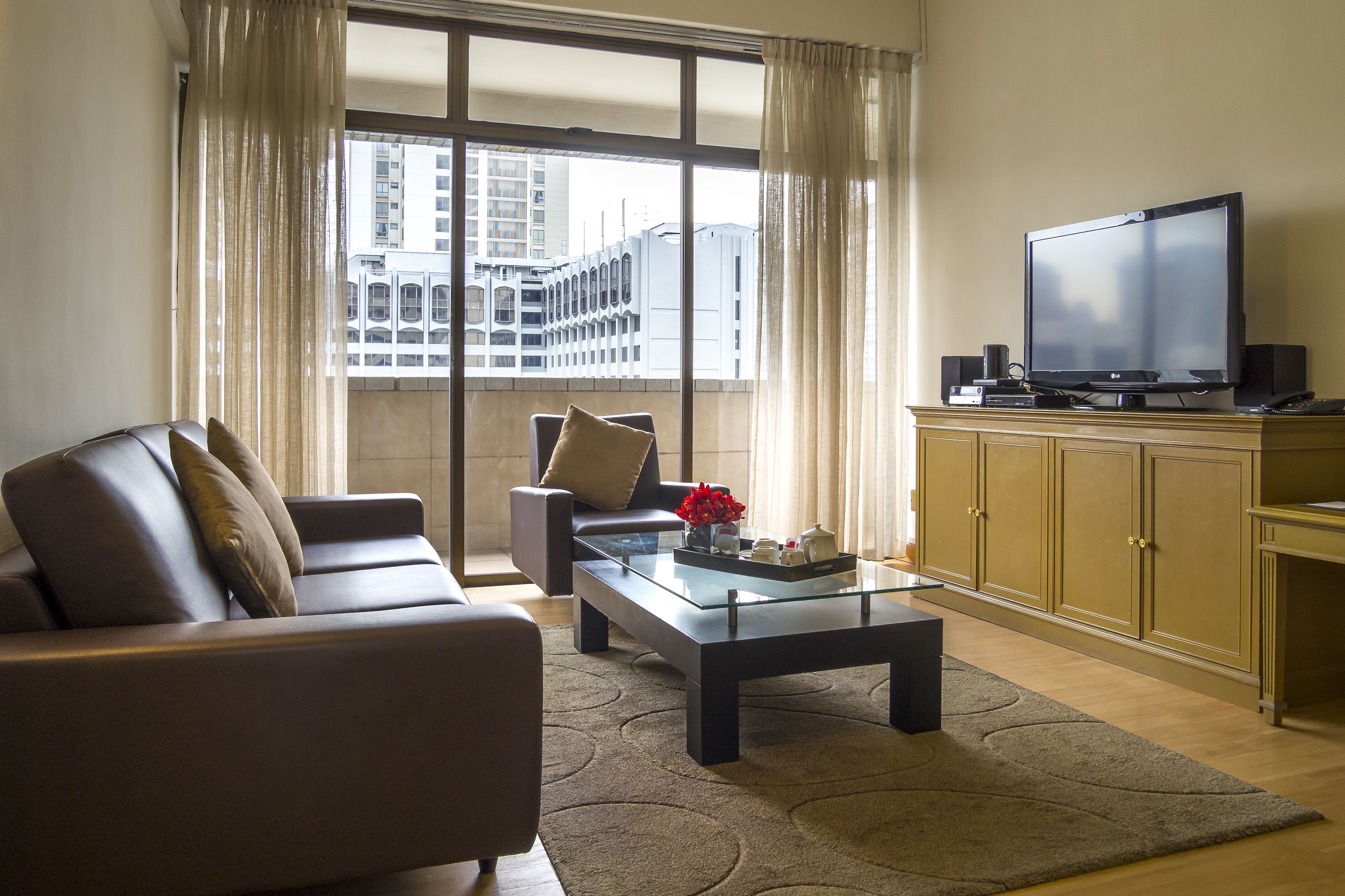 Superior Apartment, 3 Bedrooms | Living area | 42-inch LED TV with cable channels, TV, DVD player