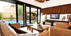 Villa, 4 Bedrooms (Deluxe) | Living room | LCD TV