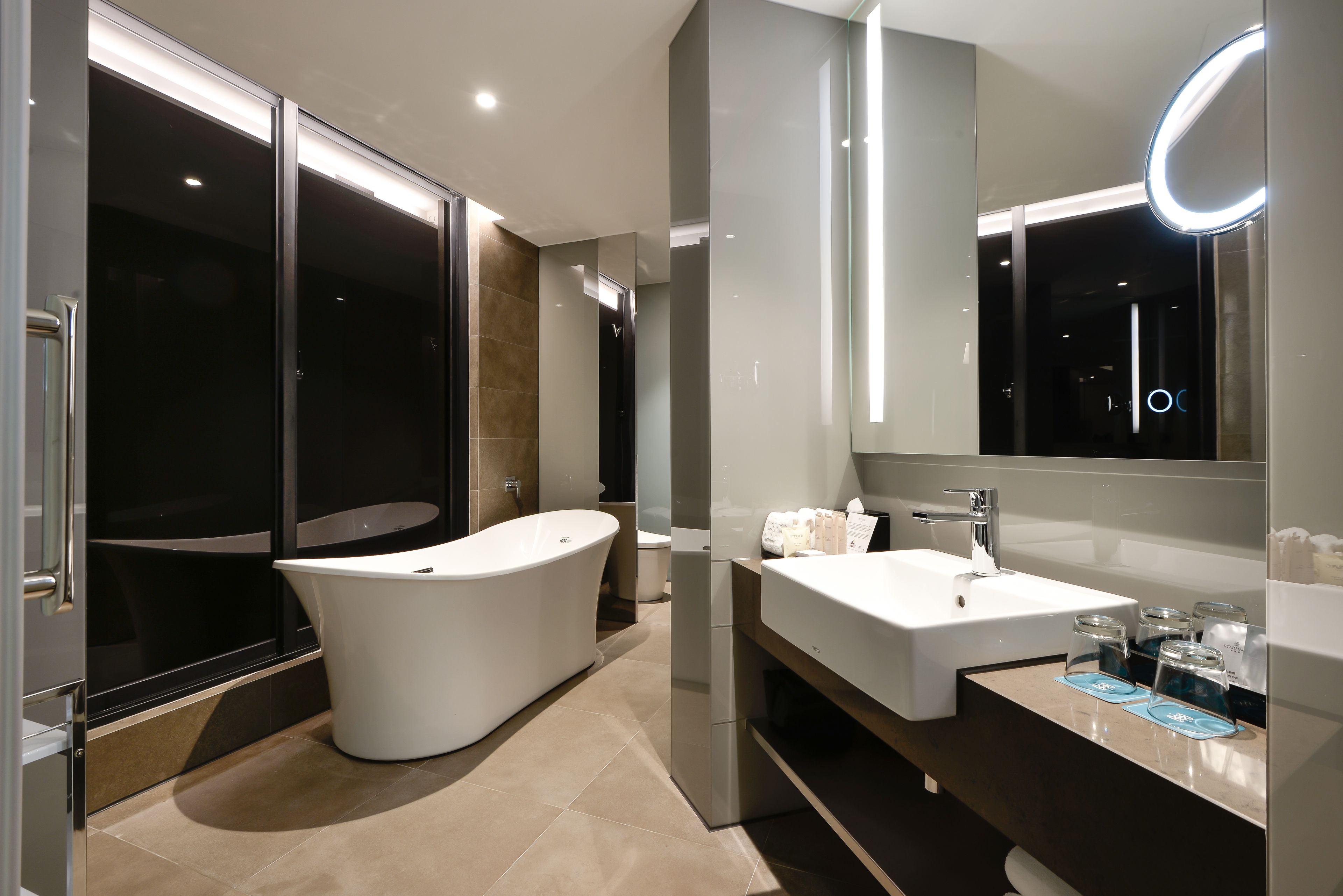 grand quadruple room | bathroom | separate bathtub and shower, jetted bath, rainfall showerhead