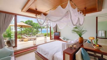 A bedroom with a large bed, a wooden ceiling, a TV, a bedside table, and a view of the outdoors.
