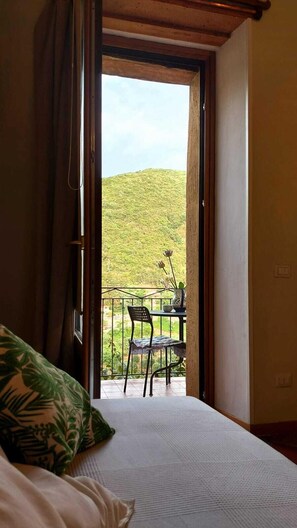 Superior Triple Room, Garden View | 1 bedroom, minibar, iron/ironing board, bed sheets