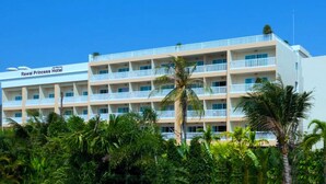 A multi-story hotel with balconies and a sign reading "Rawai Princess Hotel". - Rawai Princess Hotel (Rawai)