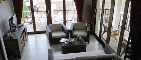 Suite (  T3  ) | Sala de estar | Televisión de pantalla plana