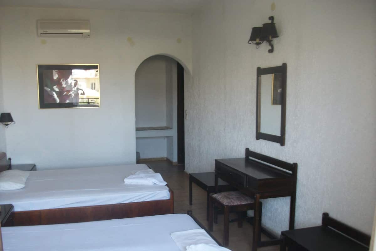 Habitación con 1 cama matrimonial o 2 individuales | Área de sala de estar