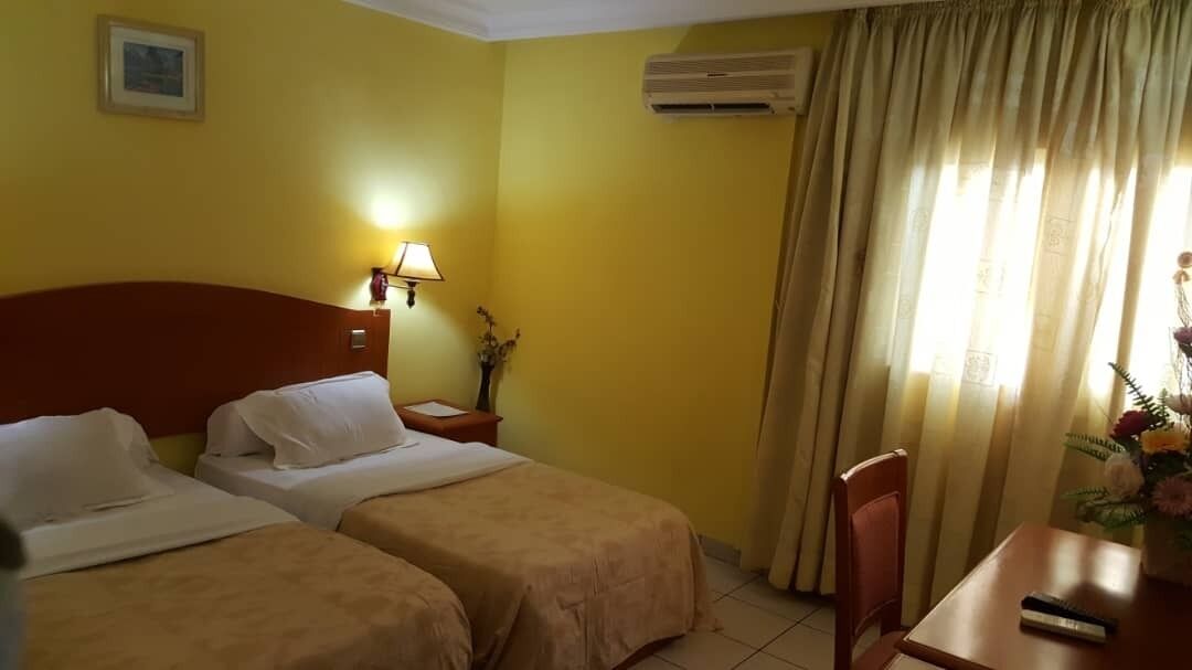 Twin Room | Desk, blackout drapes, free WiFi