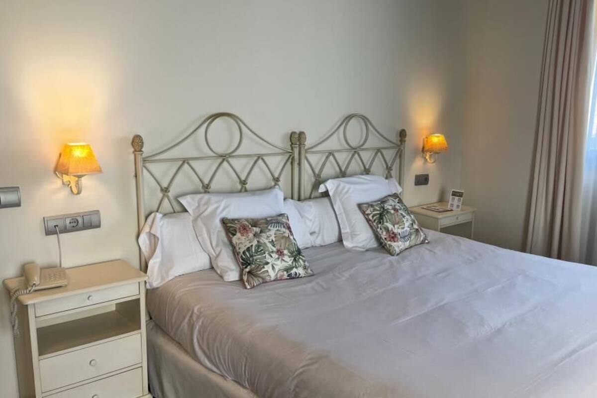 Luxe beddengoed, een minibar, een kluis op de kamer, een bureau