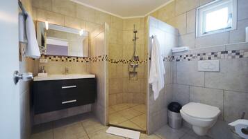 Shower, free toiletries, hair dryer, towels