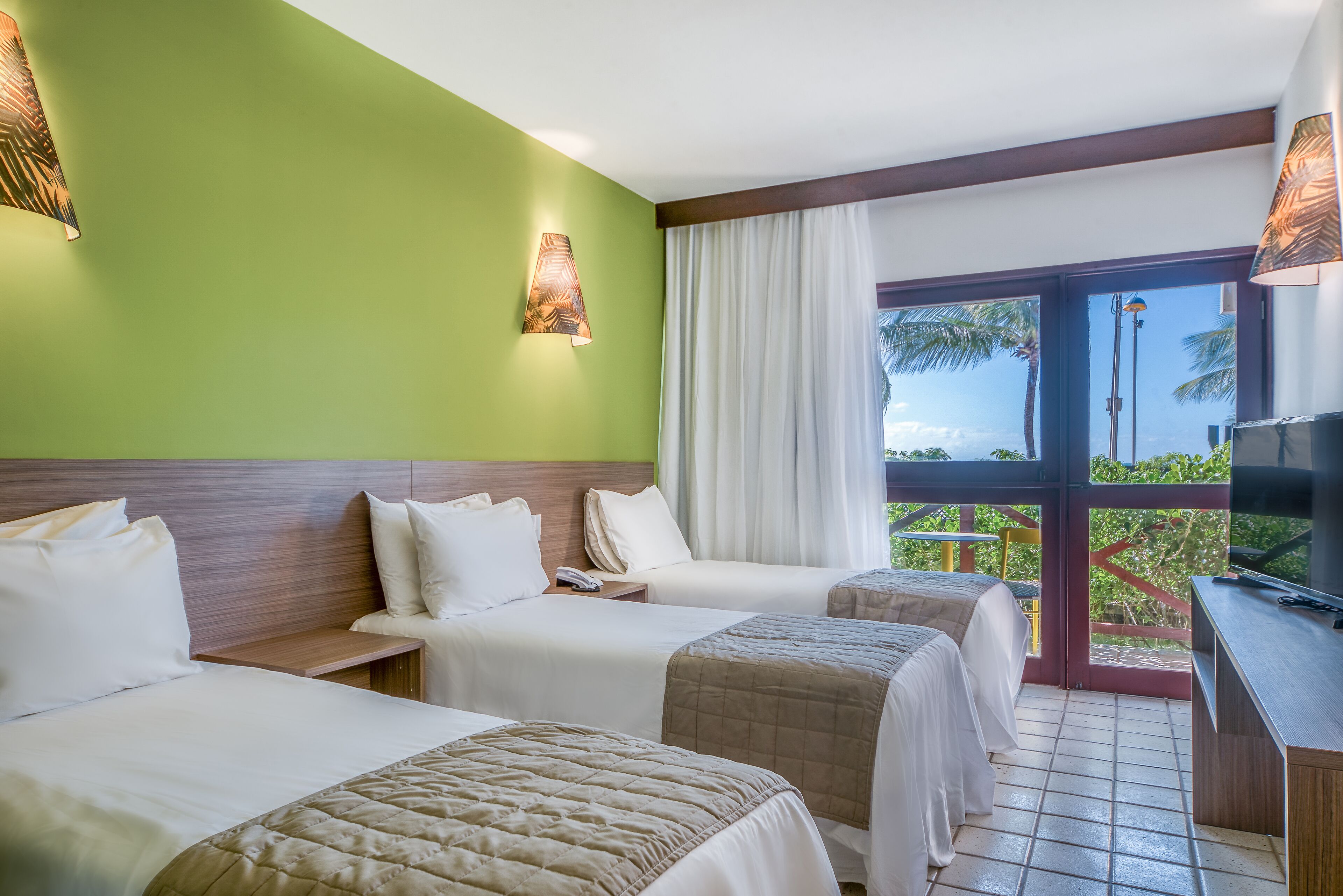 triple room, sea view | minibar, individually decorated, individually furnished, desk