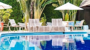 Outdoor pool, pool umbrellas, pool loungers