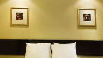 Premium bedding, down duvets, pillow-top beds, in-room safe