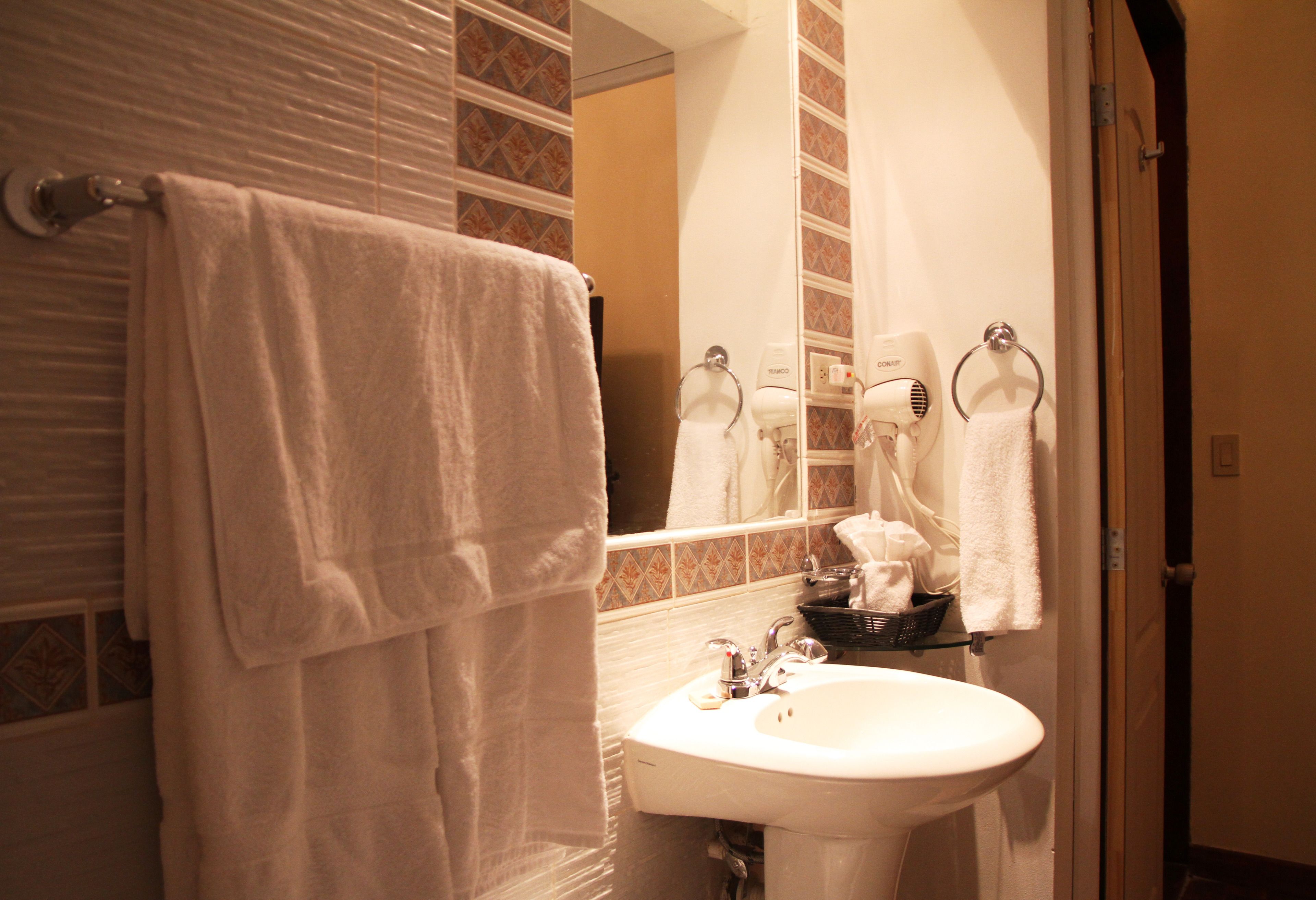 suite | bathroom | shower, free toiletries, towels, shampoo