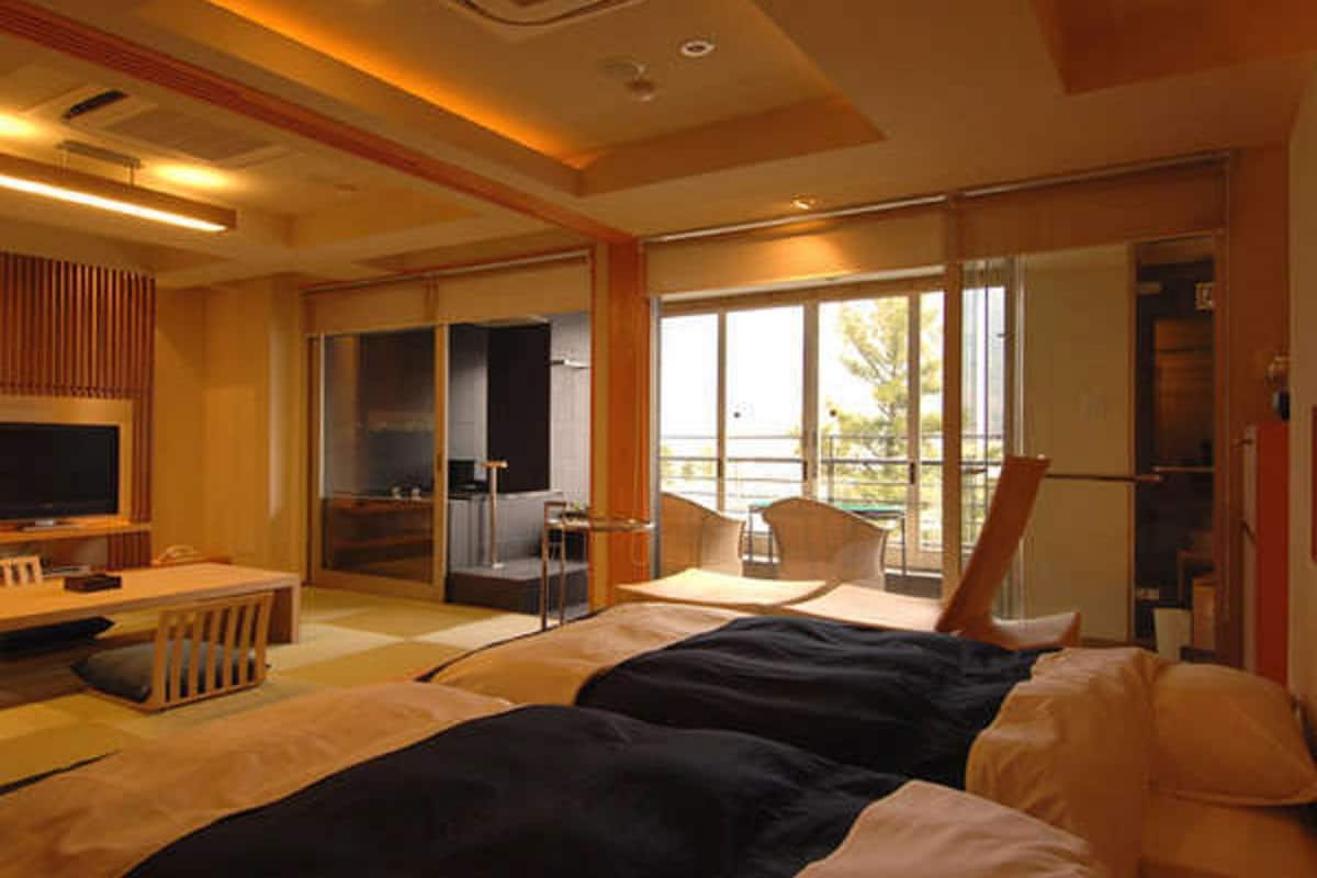 suite room with tatami area with open-air bath, (lake view) | in-room safe, desk, free wifi