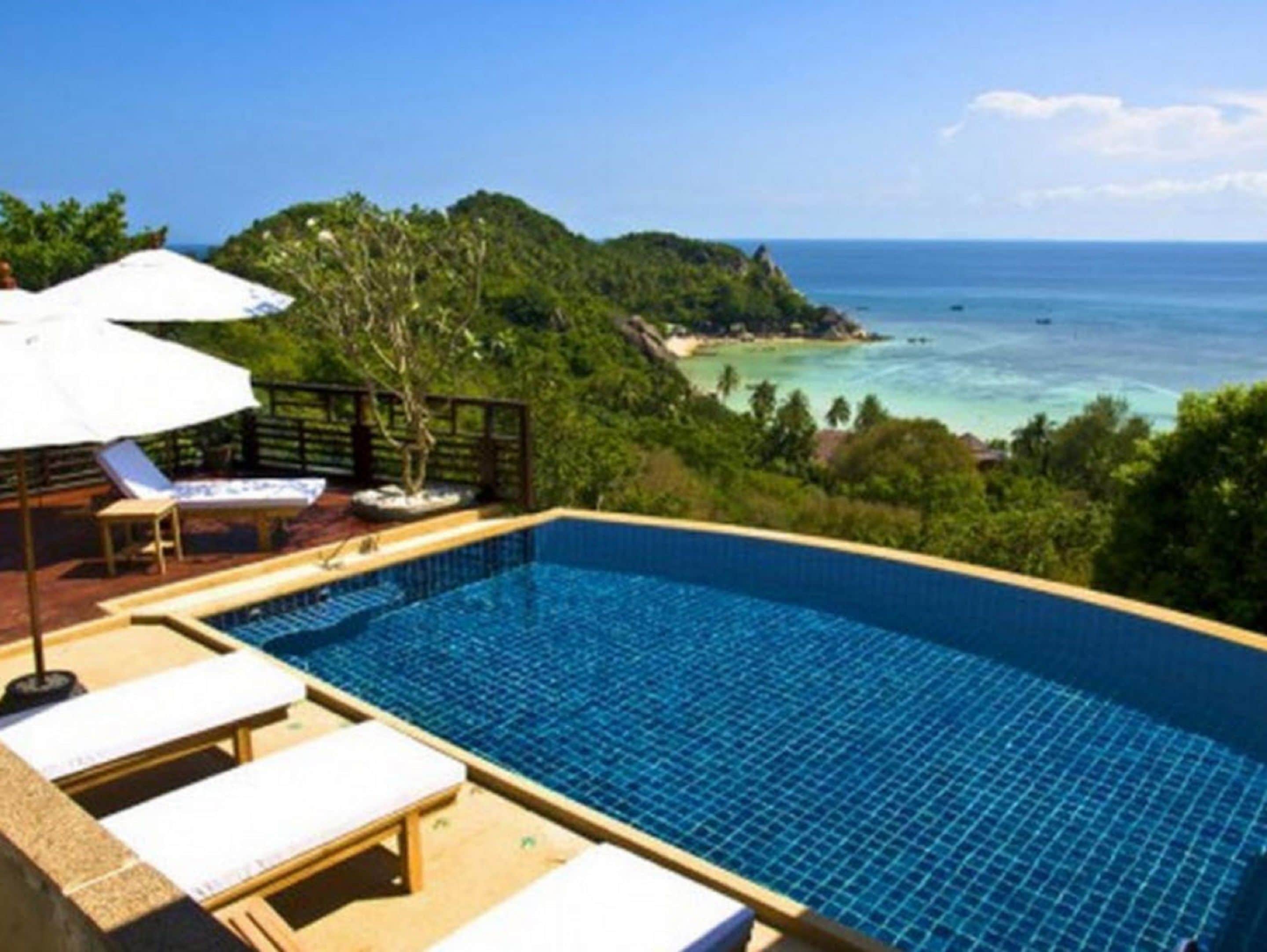 Outdoor pool, pool umbrellas, sun loungers