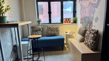 40-inch flat-screen TV with cable channels, TV