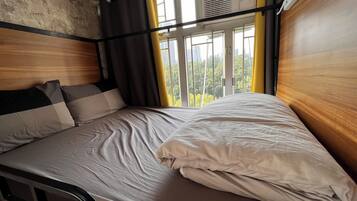 4 Person Private Room (Shared Bathroom) | Premium bedding, iron/ironing board, free WiFi, wheelchair access