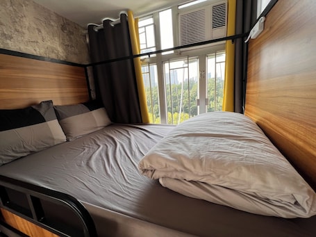 4 Person Private Room (Shared Bathroom) | Premium bedding, iron/ironing board, free WiFi, wheelchair access. Urban Pack - Hostel