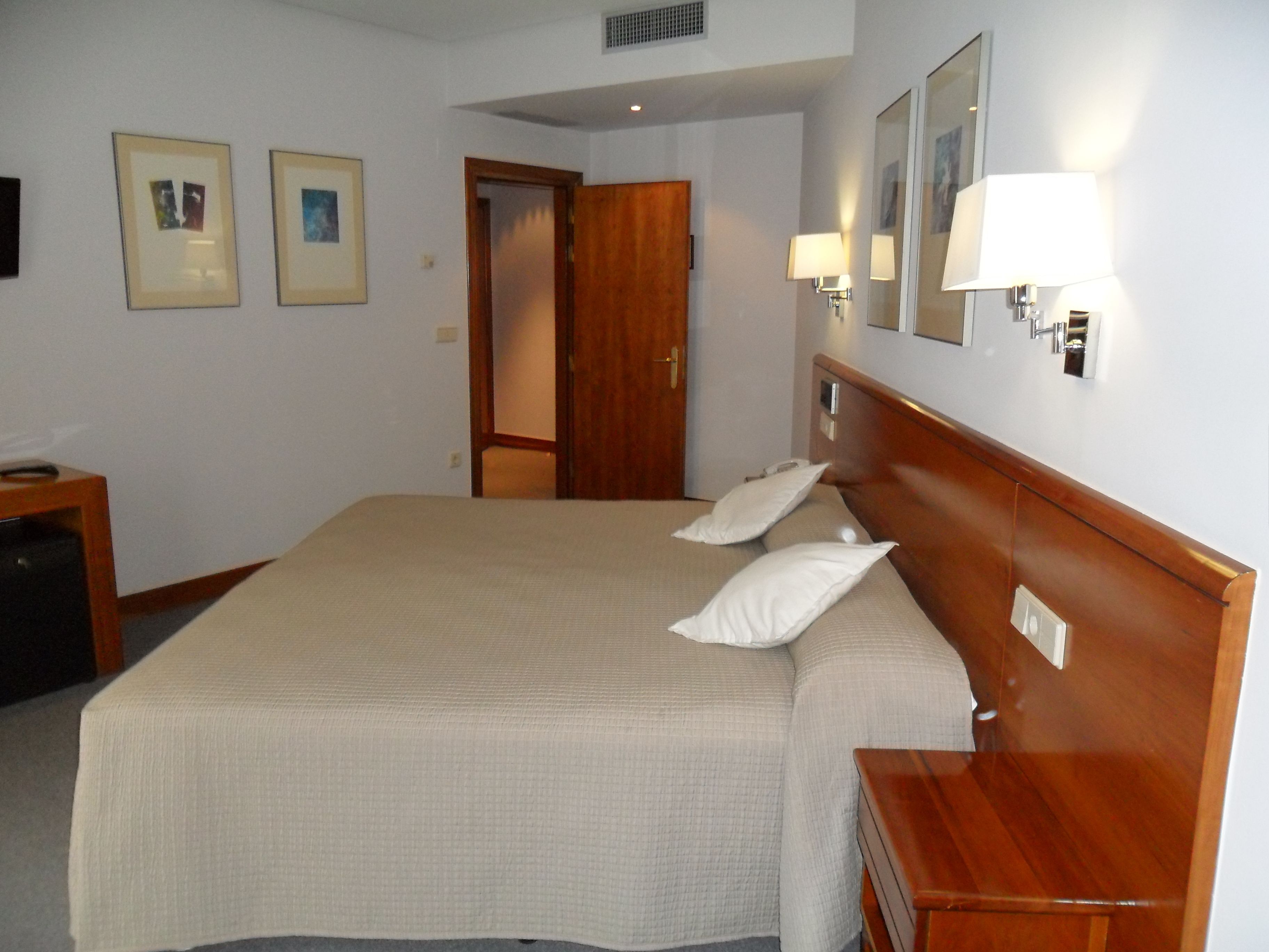 double or twin room | minibar, in-room safe, desk, laptop workspace