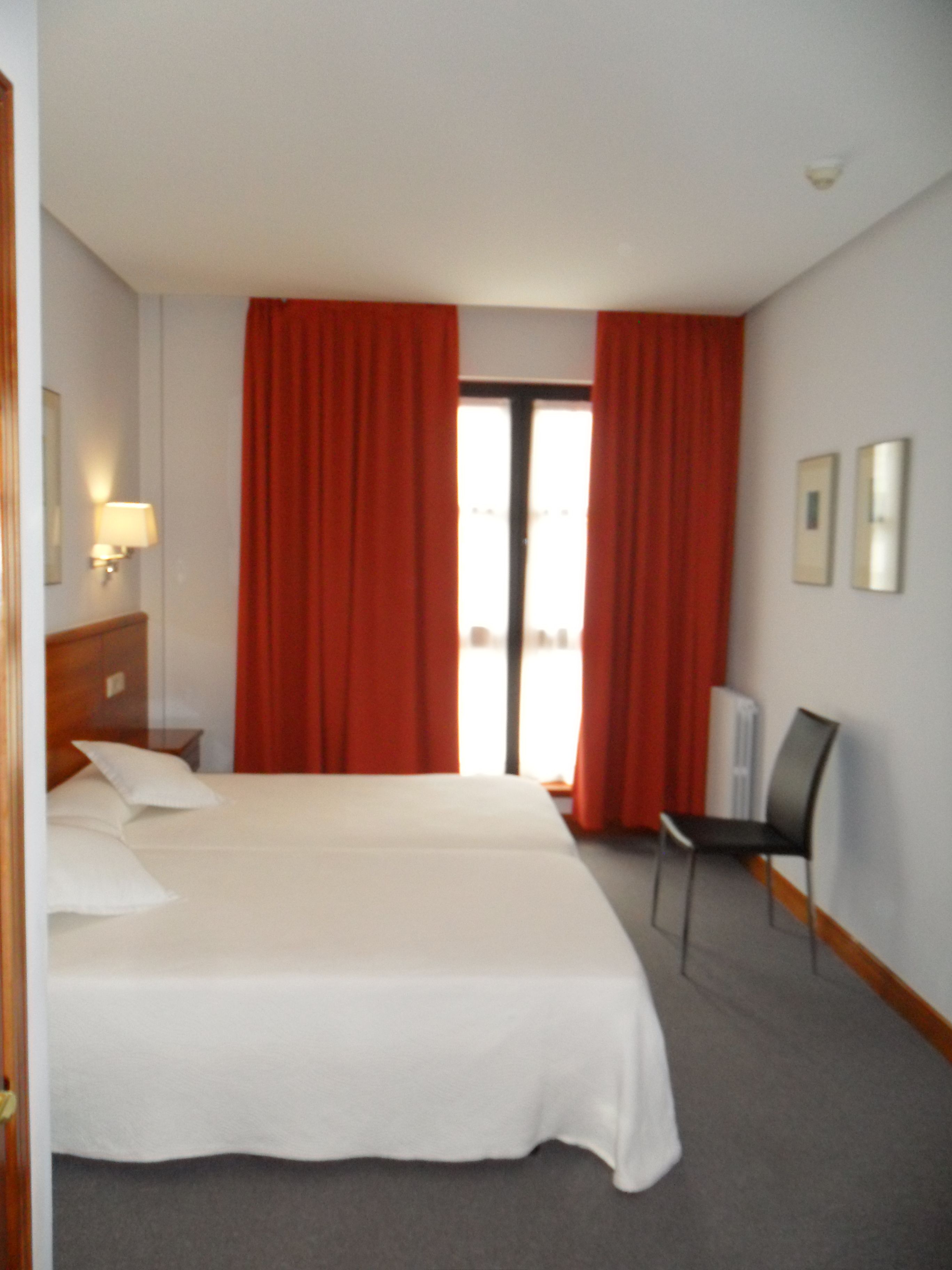 double or twin room | minibar, in-room safe, desk, laptop workspace