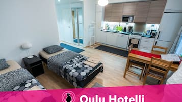 Studio | Living area | Flat-screen TV