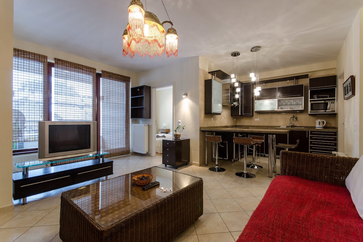 Appartement, 1 slaapkamer | Woonruimte | Een televisie