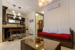 Appartement, 1 chambre | Coin séjour | Télévision