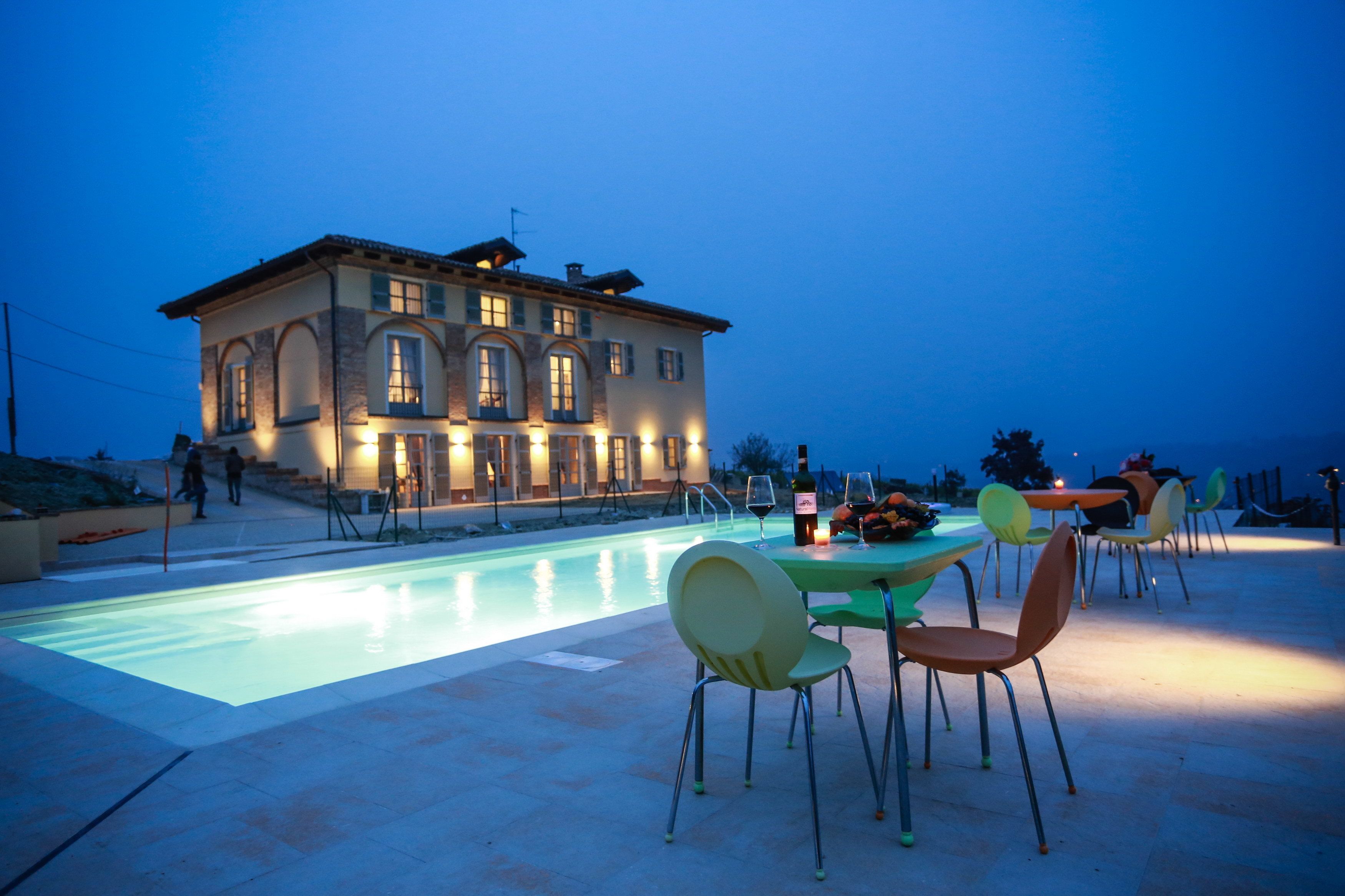 seasonal outdoor pool, pool umbrellas, pool loungers