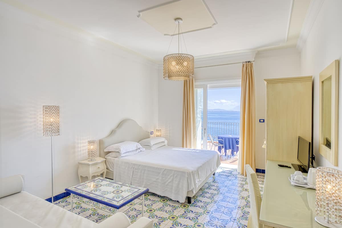 Deluxe Room, 1 Bedroom, Terrace, Sea View | 1 bedroom, minibar, in-room safe, desk
