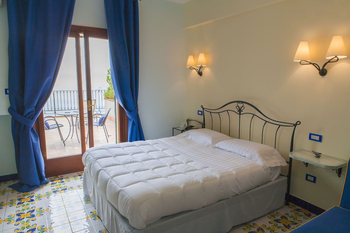 Superior Room, 1 Bedroom, Balcony, Sea View | 1 bedroom, minibar, in-room safe, desk