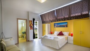 A bedroom with a bed, bedside tables, a chair, and a wardrobe. - B&B Macerata (Macerata)