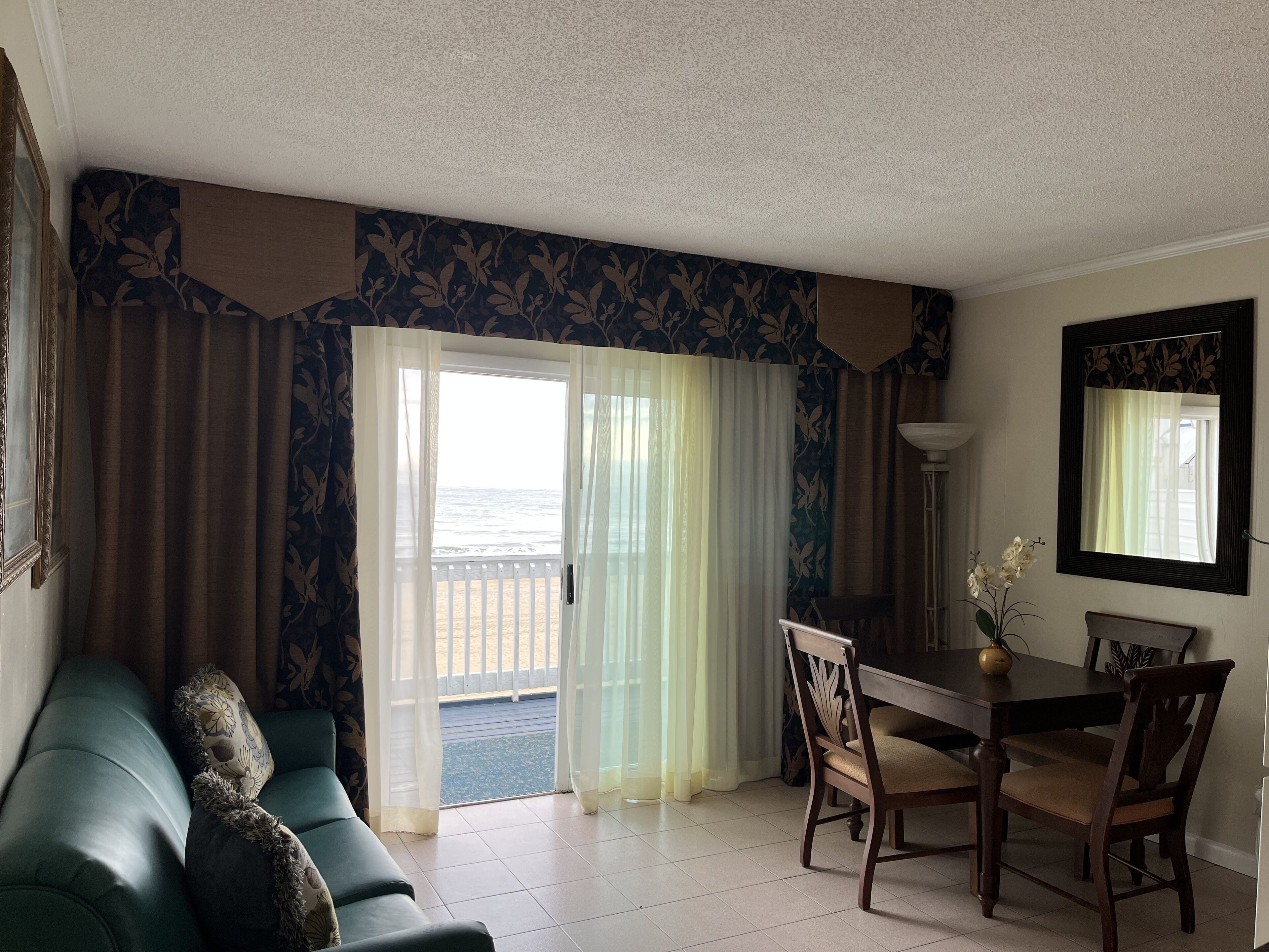 Deluxe Apartment, 1 Bedroom, Ocean View (Oceanfront) | Living area | Flat-screen TV