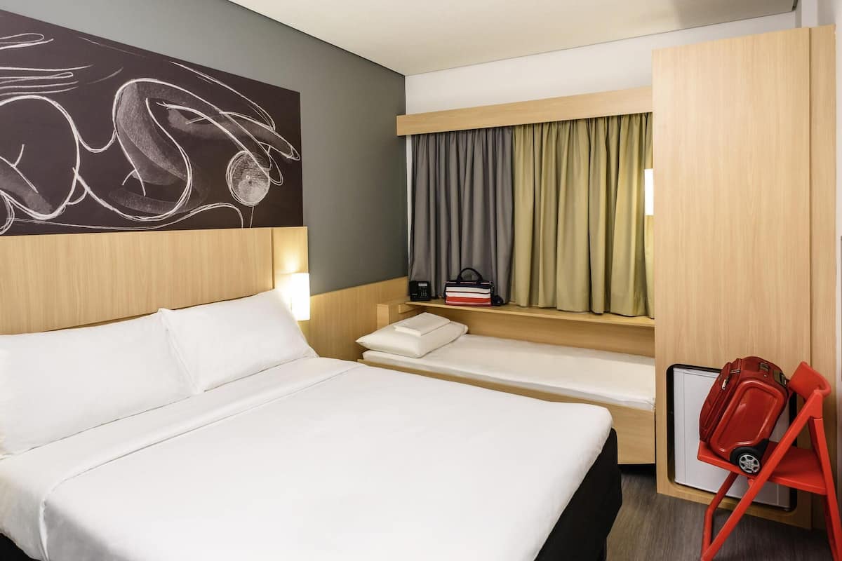 Standard Room, Multiple Beds | Minibar, in-room safe, desk, blackout curtains