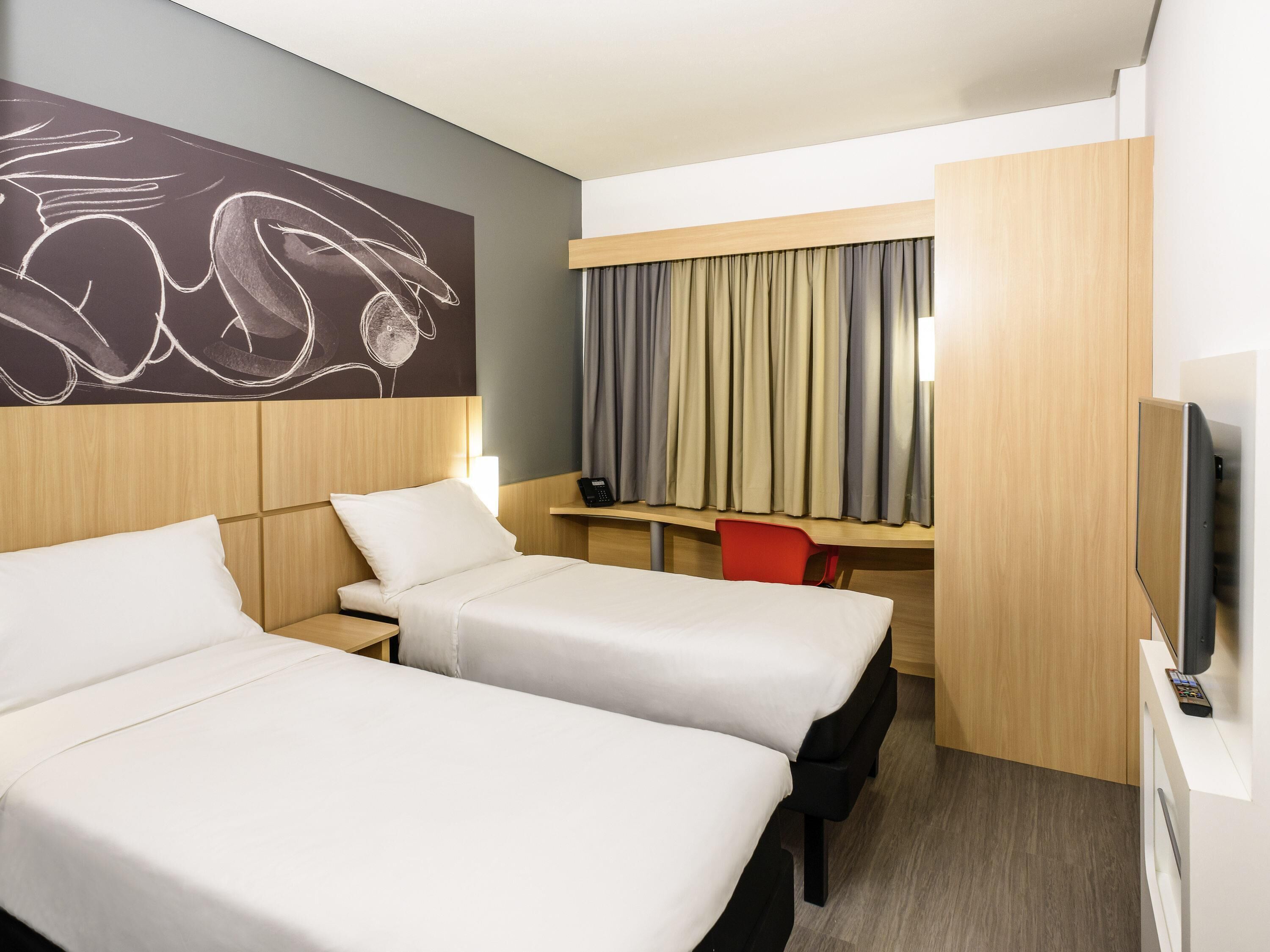 Standard Room, 2 Twin Beds | Minibar, in-room safe, desk, blackout drapes