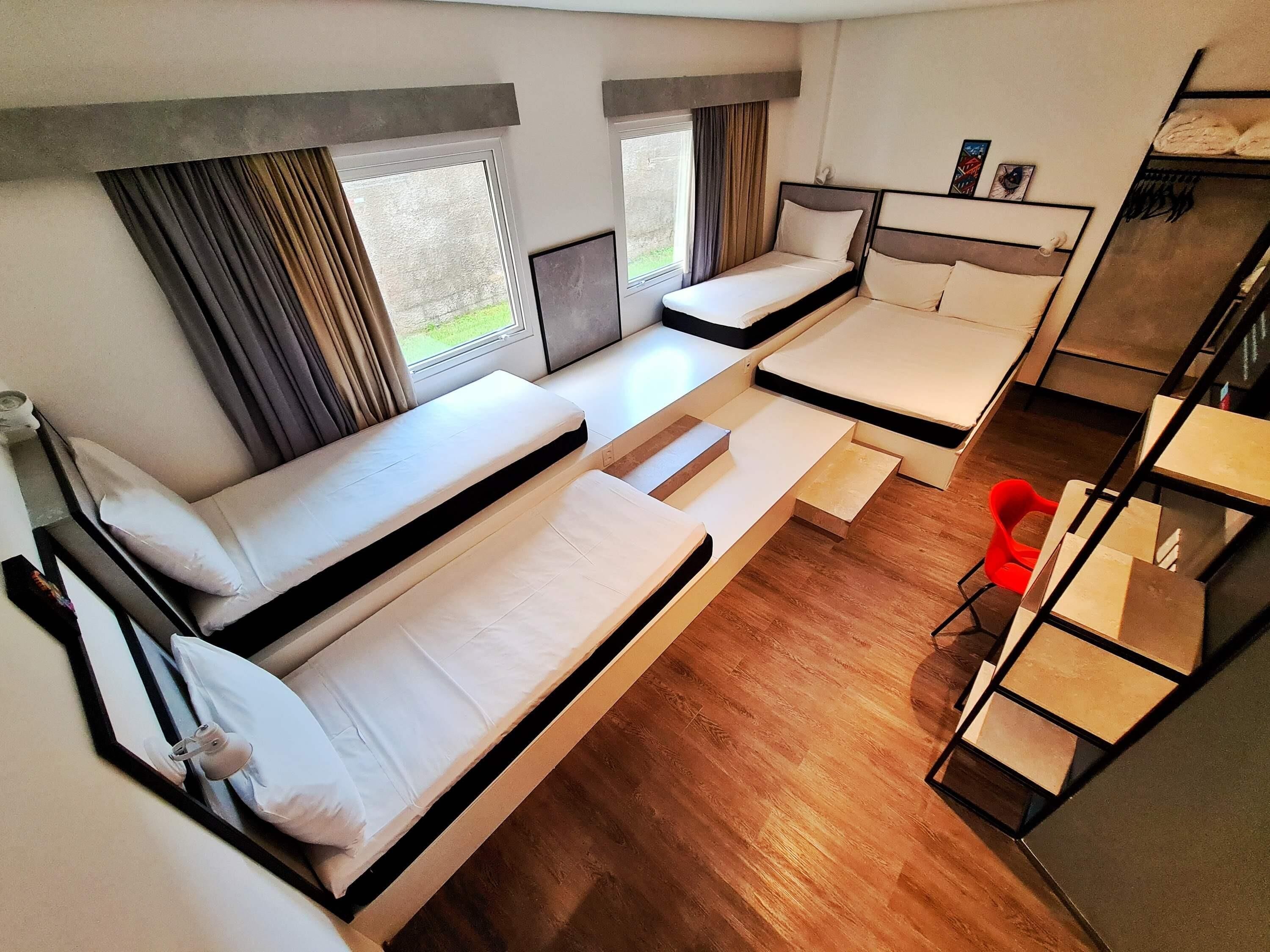 Family Room, 2 Double Beds | Minibar, in-room safe, desk, blackout drapes