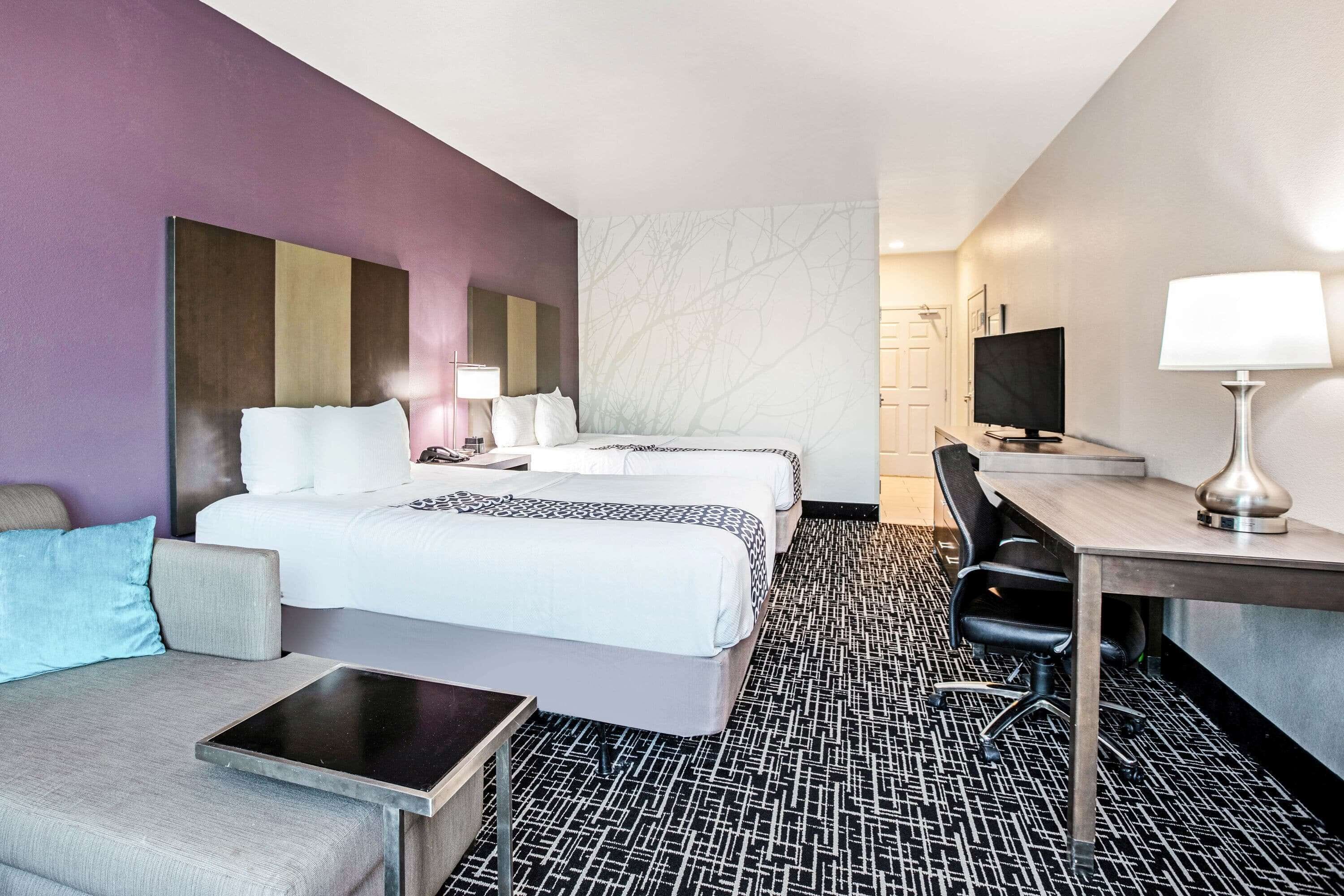 deluxe room, 2 queen beds, non smoking (various views) | pillow-top beds, desk, iron/ironing board, free cots/infant beds