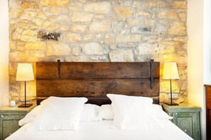 Premium bedding, down duvets, individually decorated