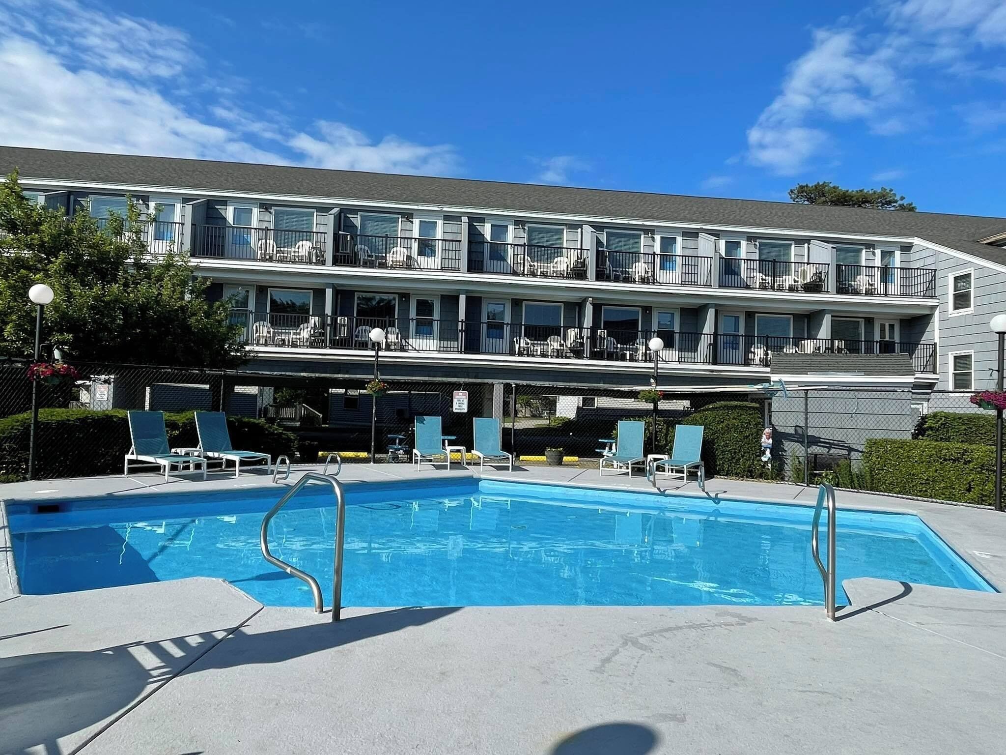 Outdoor pool, a heated pool, sun loungers