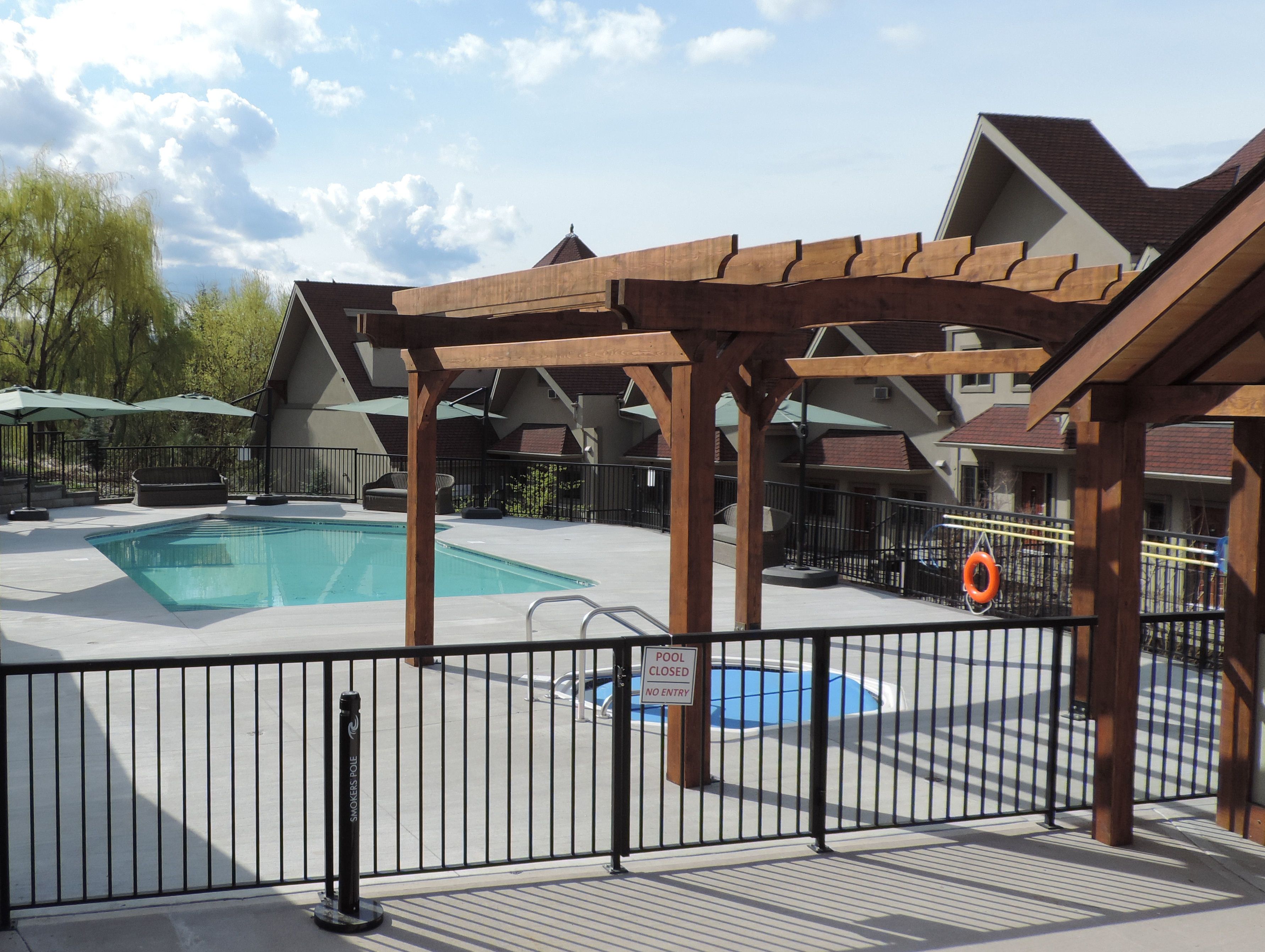 seasonal outdoor pool, pool umbrellas, pool loungers