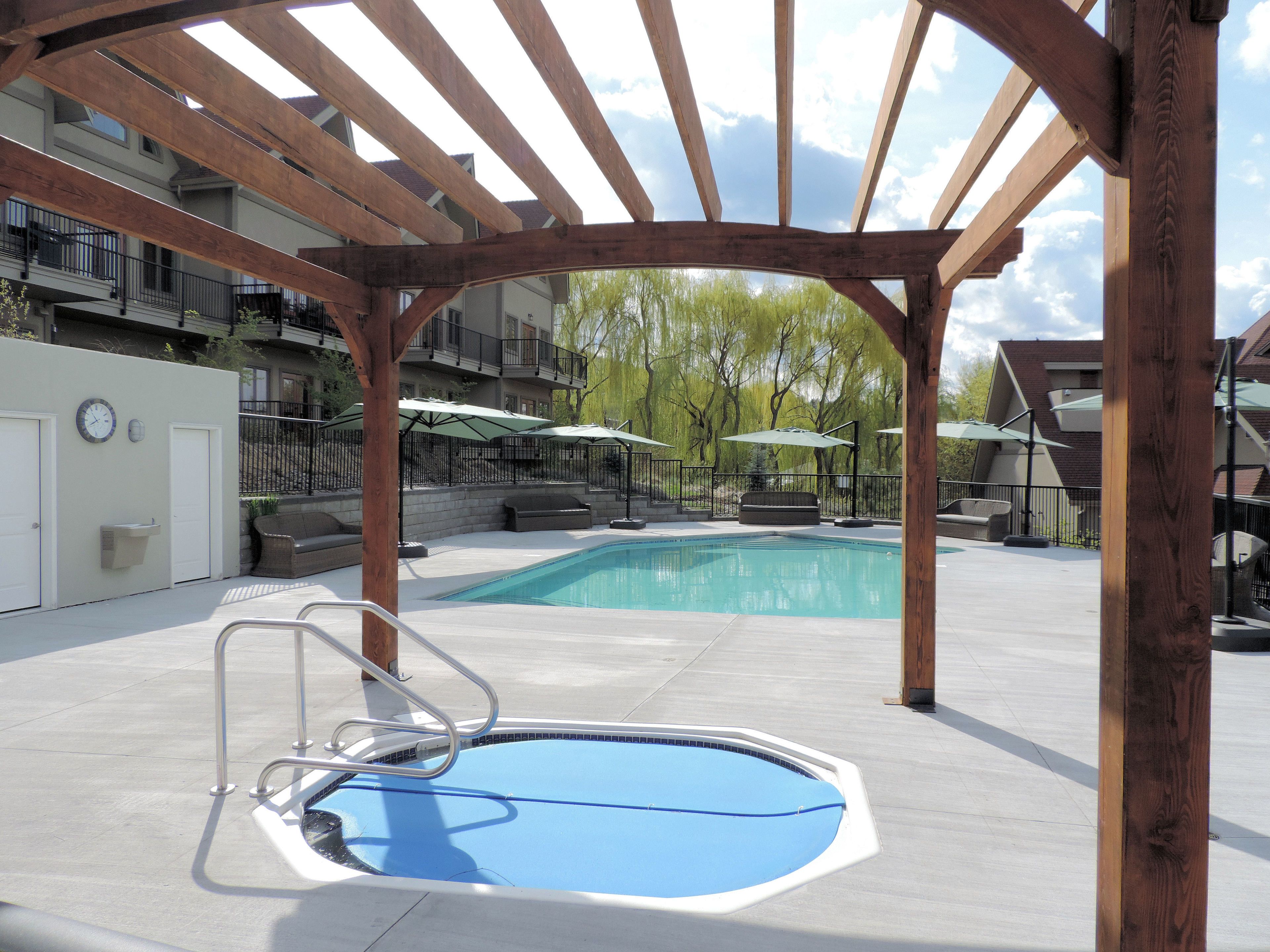 seasonal outdoor pool, pool umbrellas, pool loungers