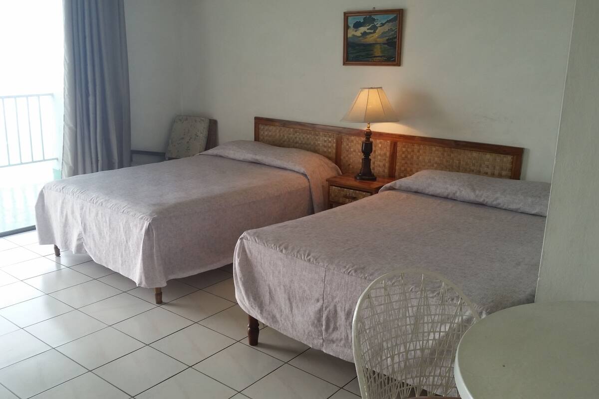 basic apartment, ocean view, beachside | iron/ironing board, wifi, bed sheets