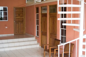 Twin Room (1 Double, 1 twin) | Balcony view