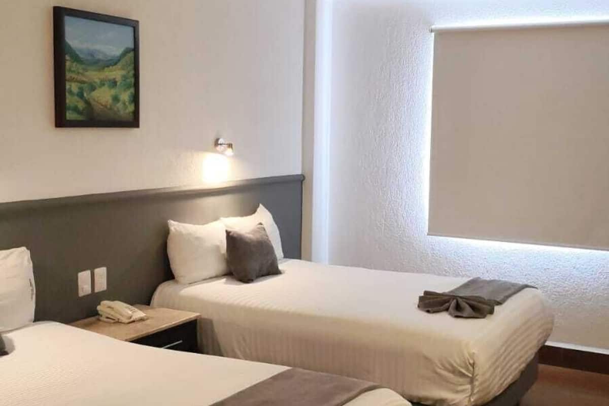 Desk, blackout curtains, free WiFi, bed sheets