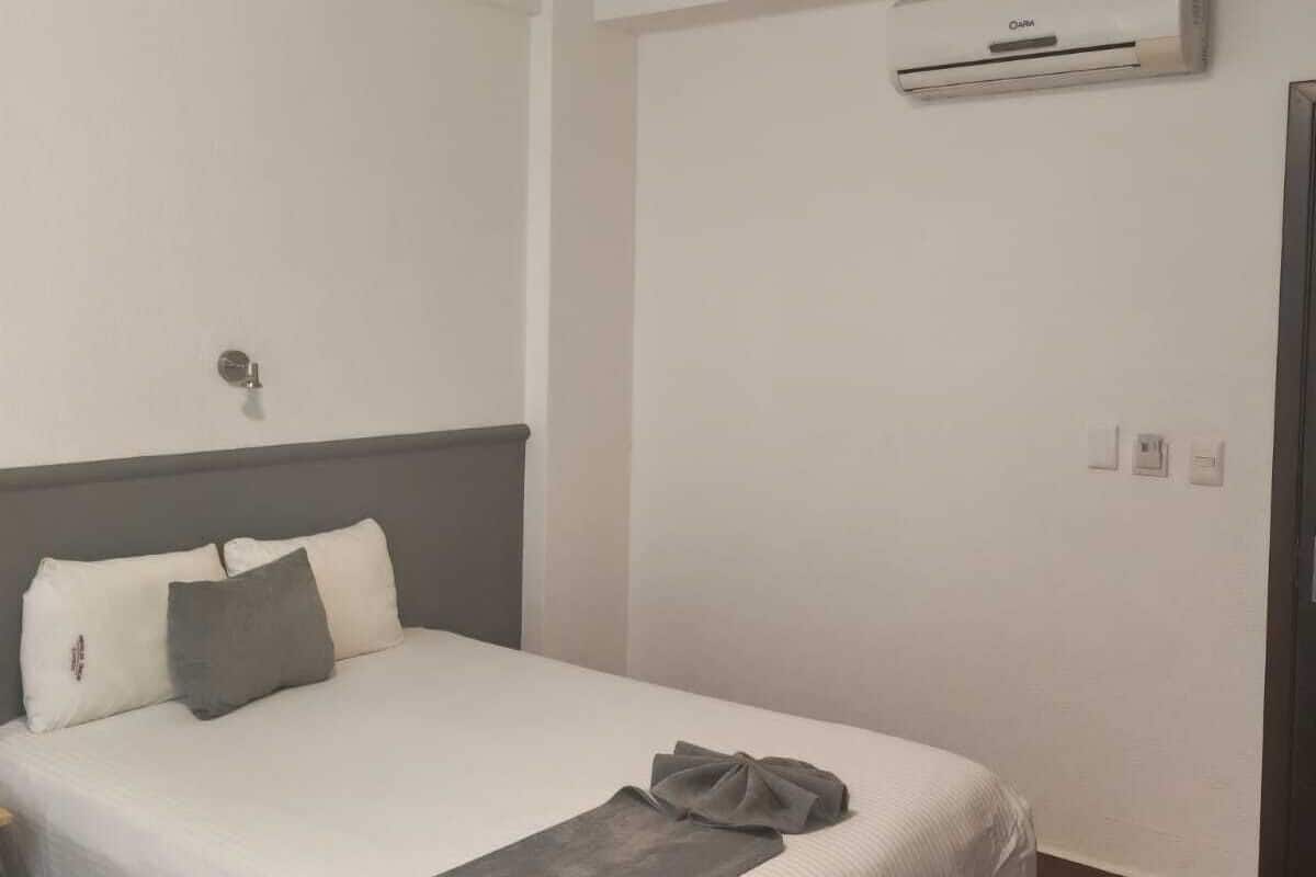 Desk, blackout curtains, free WiFi, bed sheets