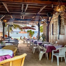 Breakfast, lunch, dinner served; international cuisine, beach views